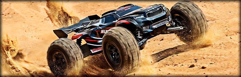 Traxxas Sledge: 1/8 Scale 4WD Brushless Electric Monster Truck with TQi 2.4GHz Traxxas Link Enabled Radio System, Velineon VXL-6s ESC (fwd/rev), and Traxxas Stability Management (TSM) - Orange